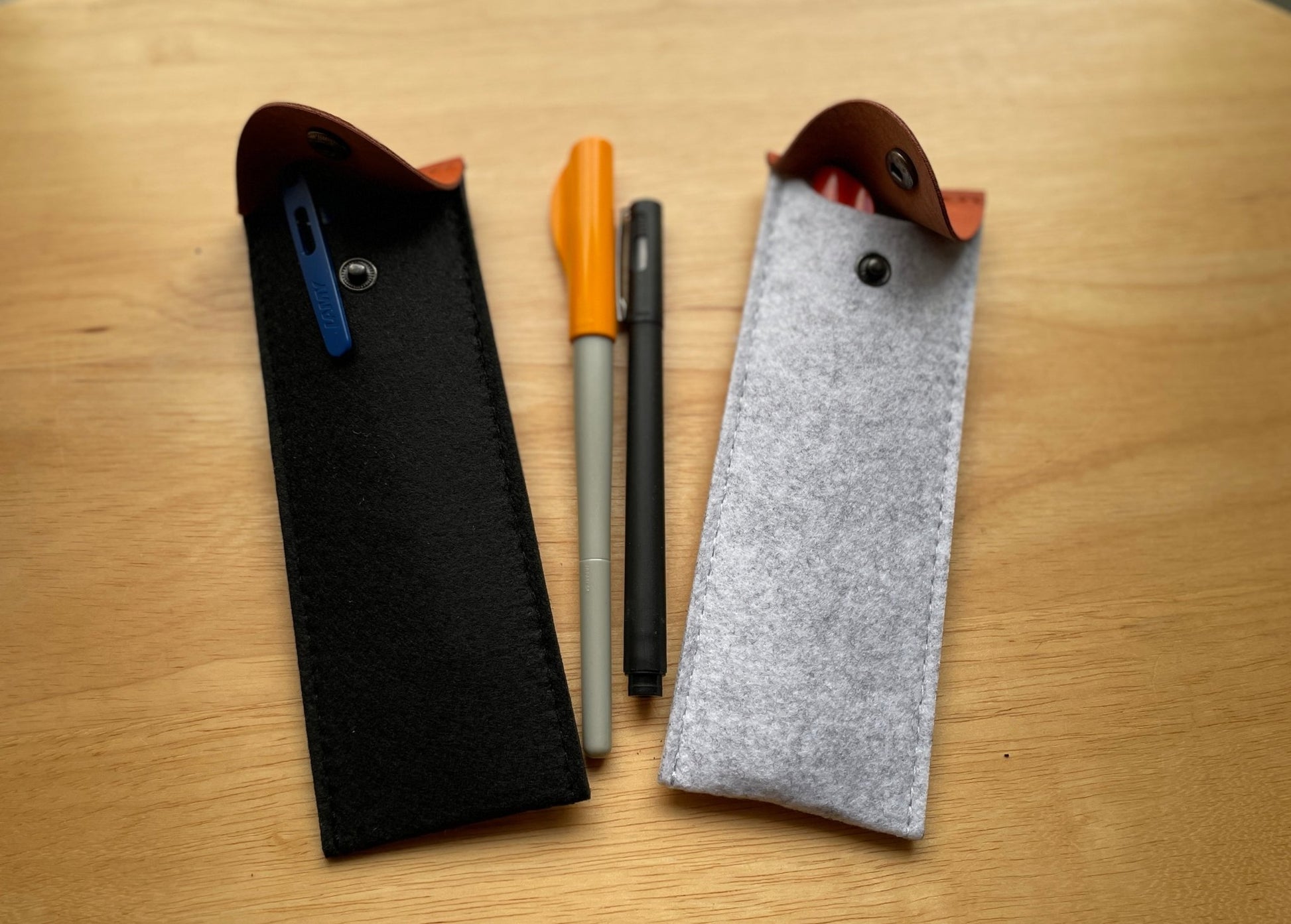 Elevate Your Workspace with Stylish Felt Pencil Cases: Diverse Flat and Round Designs for Effortless and Organized Stationery Storage. Simplify Your Desk with Minimalist Practicality - Simplidecor