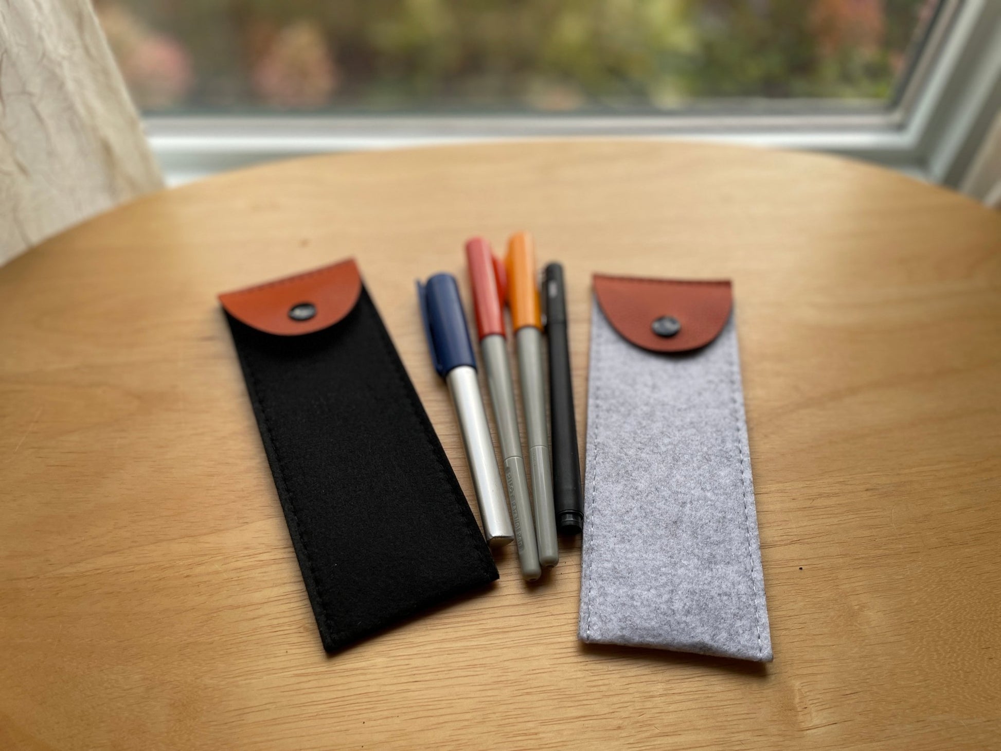 Elevate Your Workspace with Stylish Felt Pencil Cases: Diverse Flat and Round Designs for Effortless and Organized Stationery Storage. Simplify Your Desk with Minimalist Practicality - Simplidecor