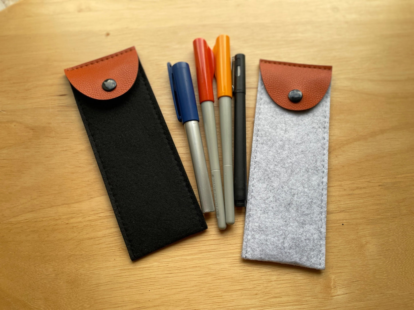 Elevate Your Workspace with Stylish Felt Pencil Cases: Diverse Flat and Round Designs for Effortless and Organized Stationery Storage. Simplify Your Desk with Minimalist Practicality - Simplidecor