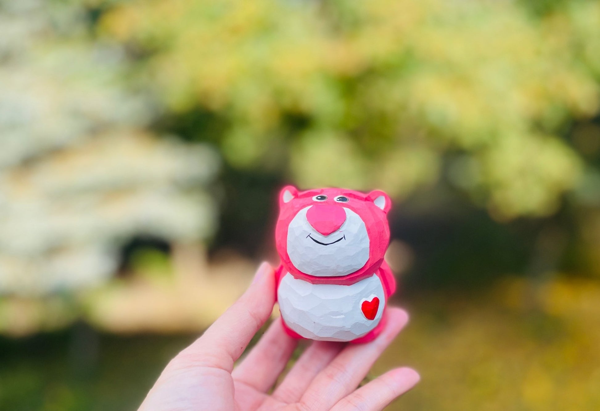 Strawberry Bear Carving: Handcrafted Wood Art - Simplidecor