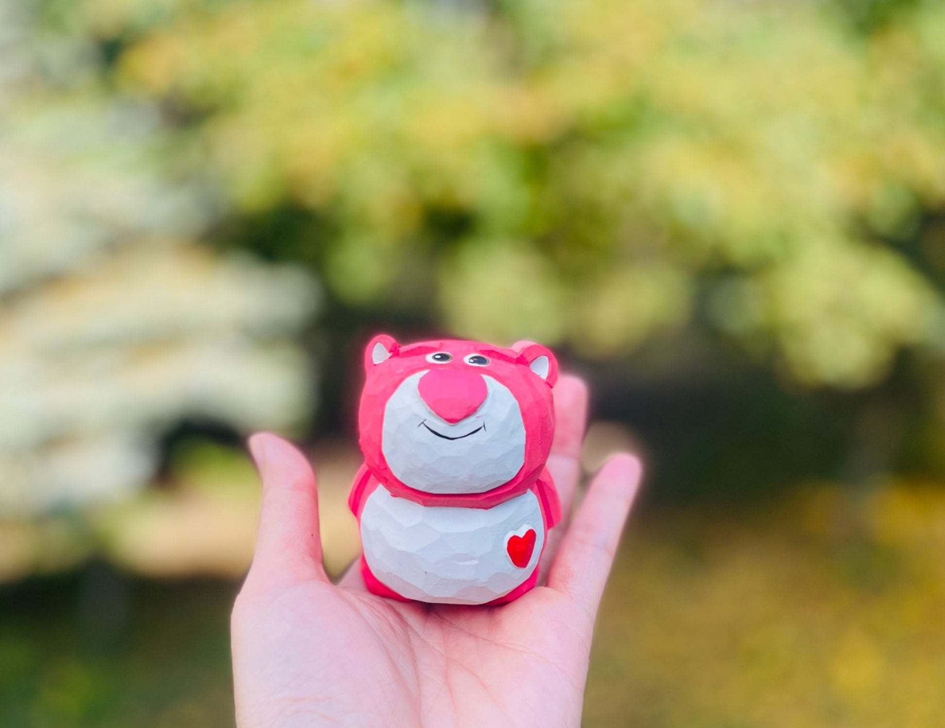 Strawberry Bear Carving: Handcrafted Wood Art - Simplidecor